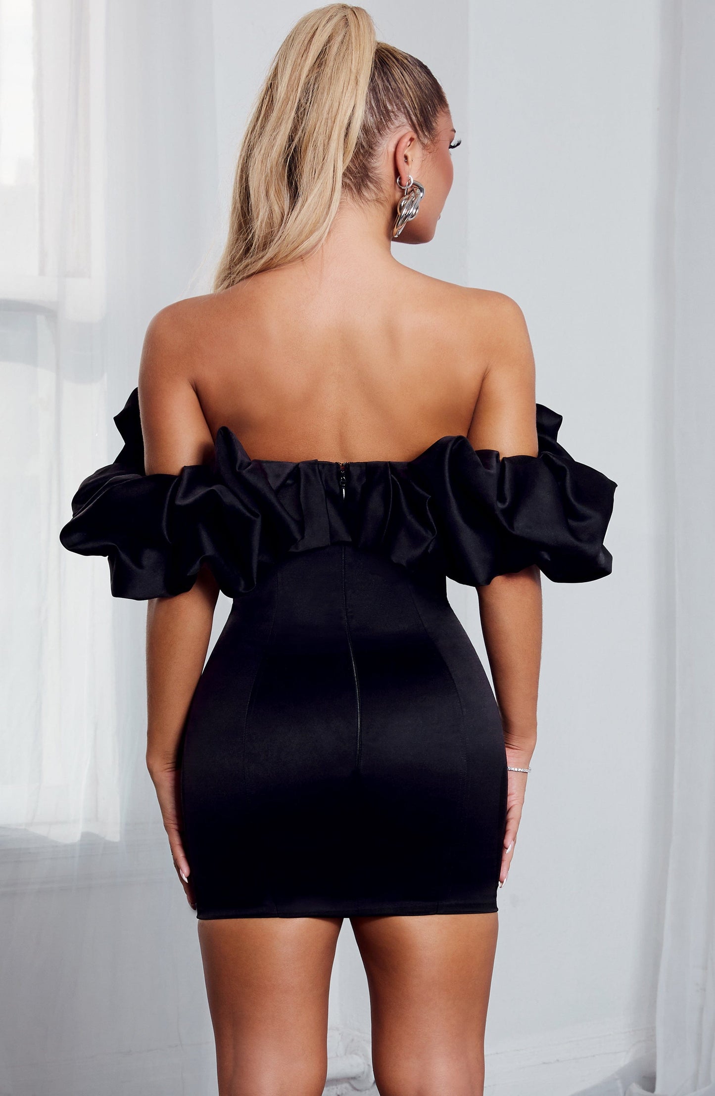 Luvrefashion | Allie Black Mini Dress in XS - back view