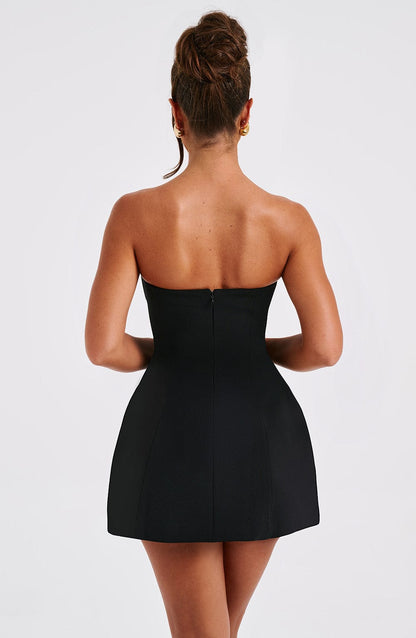 Luvrefashion | Asha Black Mini Dress in XS - back view