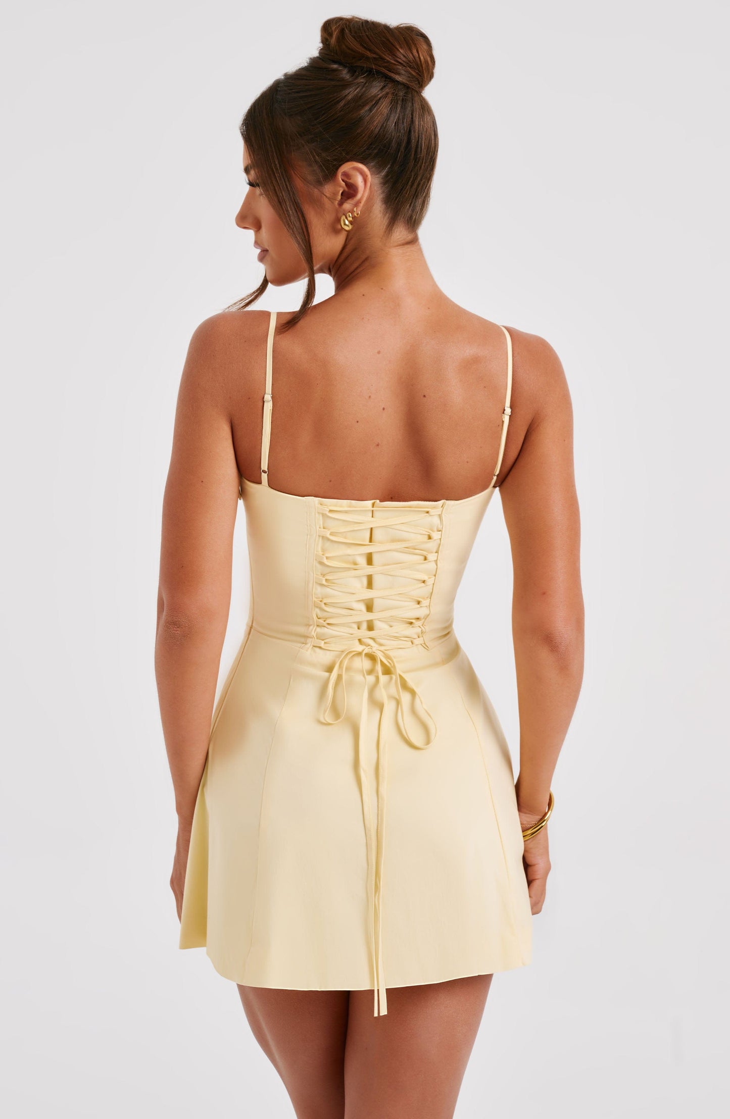 Luvrefashion | Lemon Lacey Mini Dress in XS - side view