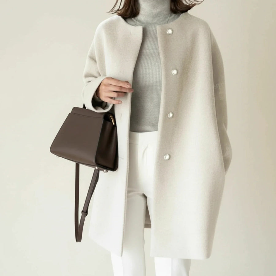 Luvrefashion | Sleek Collarless Winter Coat in Black - back view