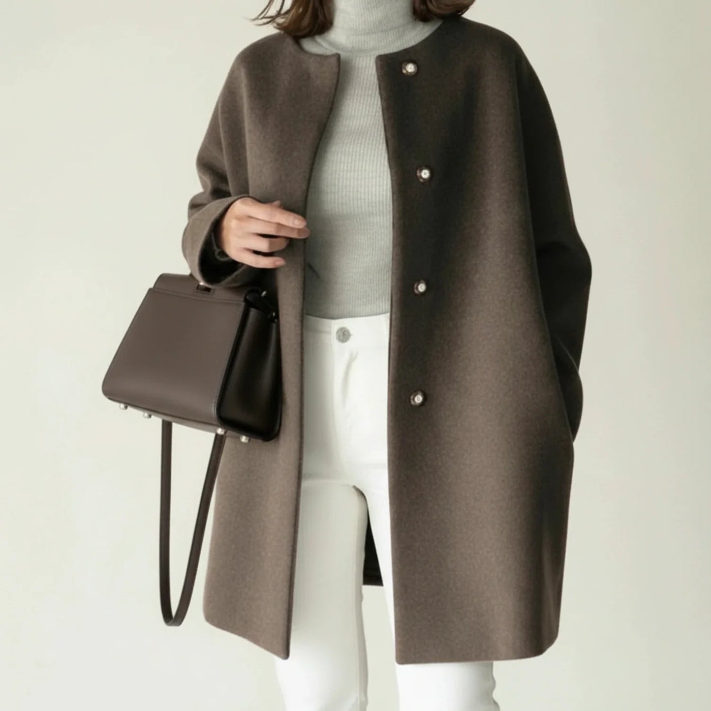 Sleek Collarless Winter Coat in Black - side view